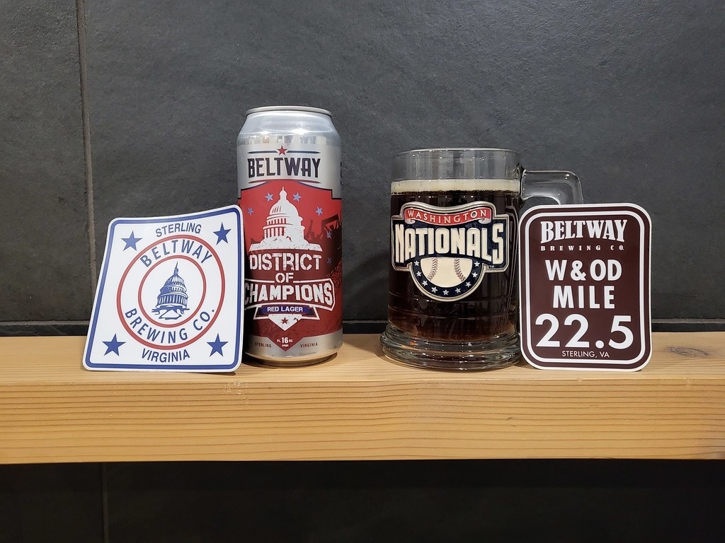 Photo of Beltway Brewing District of Champions Red Lager with brewery stickers