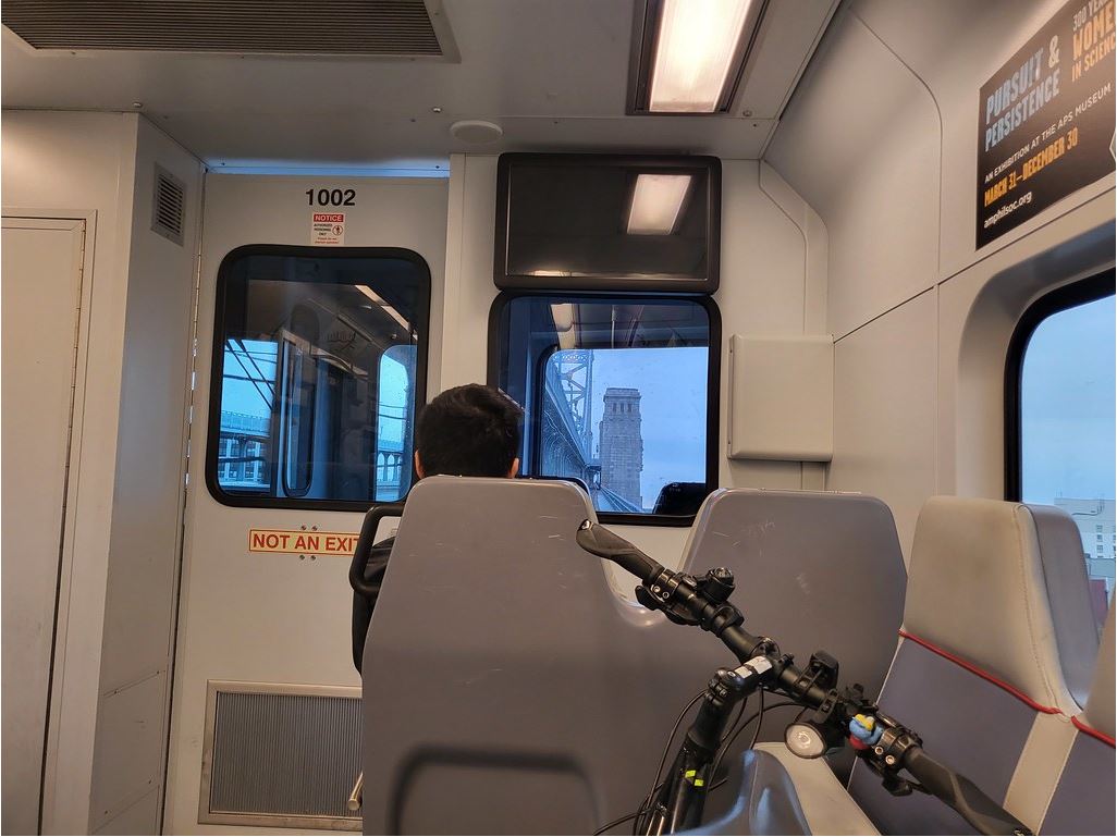 Crossing the Ben Franklin Bridge by train and bicycle