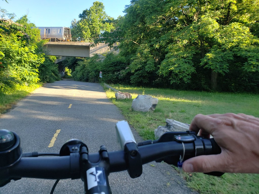 Summer 2021 bike ride with view of Metro Blue Line bridge over Holmes Run